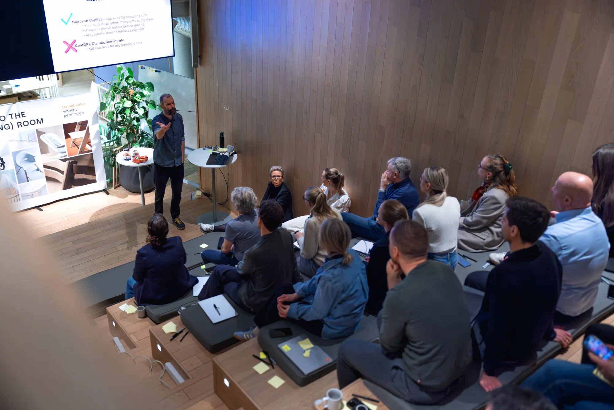 Wide overview of the Stokke Steering Room during a session